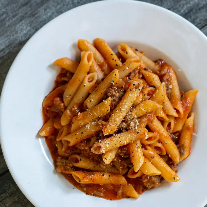 Golden baked pasta in a serving dish