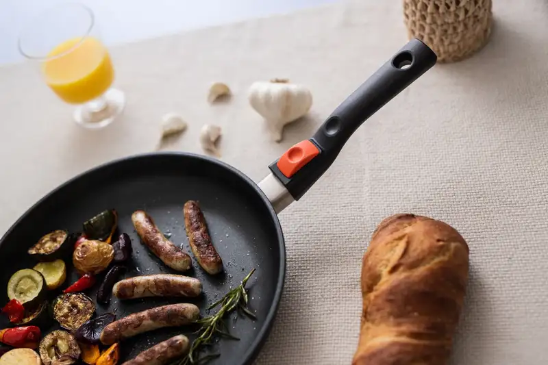 Roasted sausage and vegetables in a pan