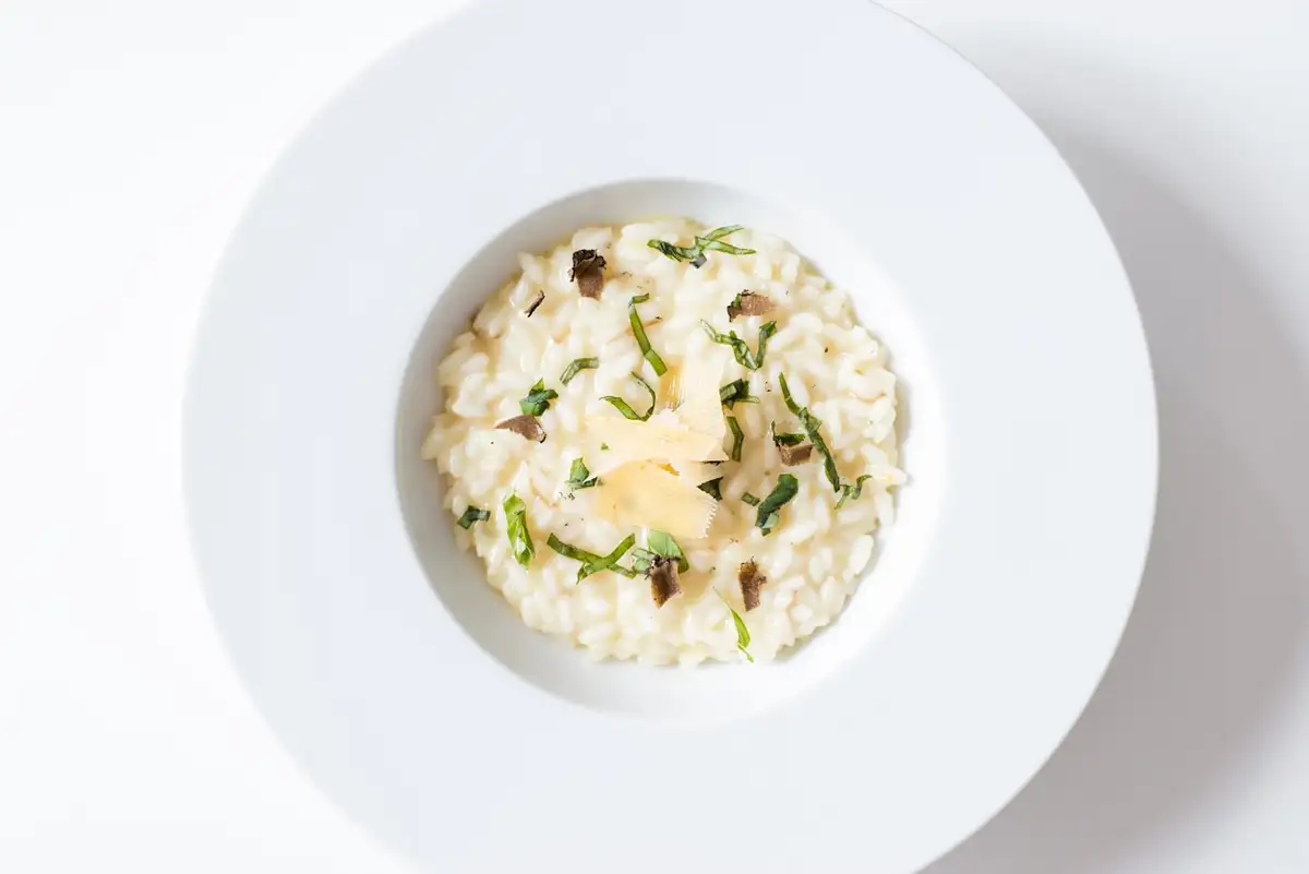 Creamy mushroom risotto topped with herbs