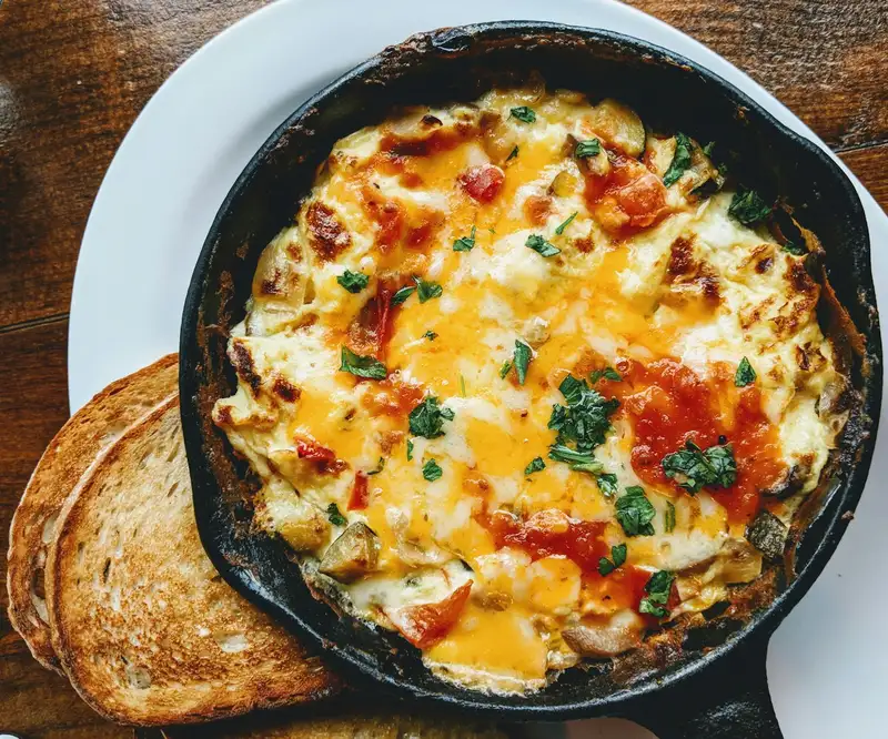 Baked eggs in tomato rice